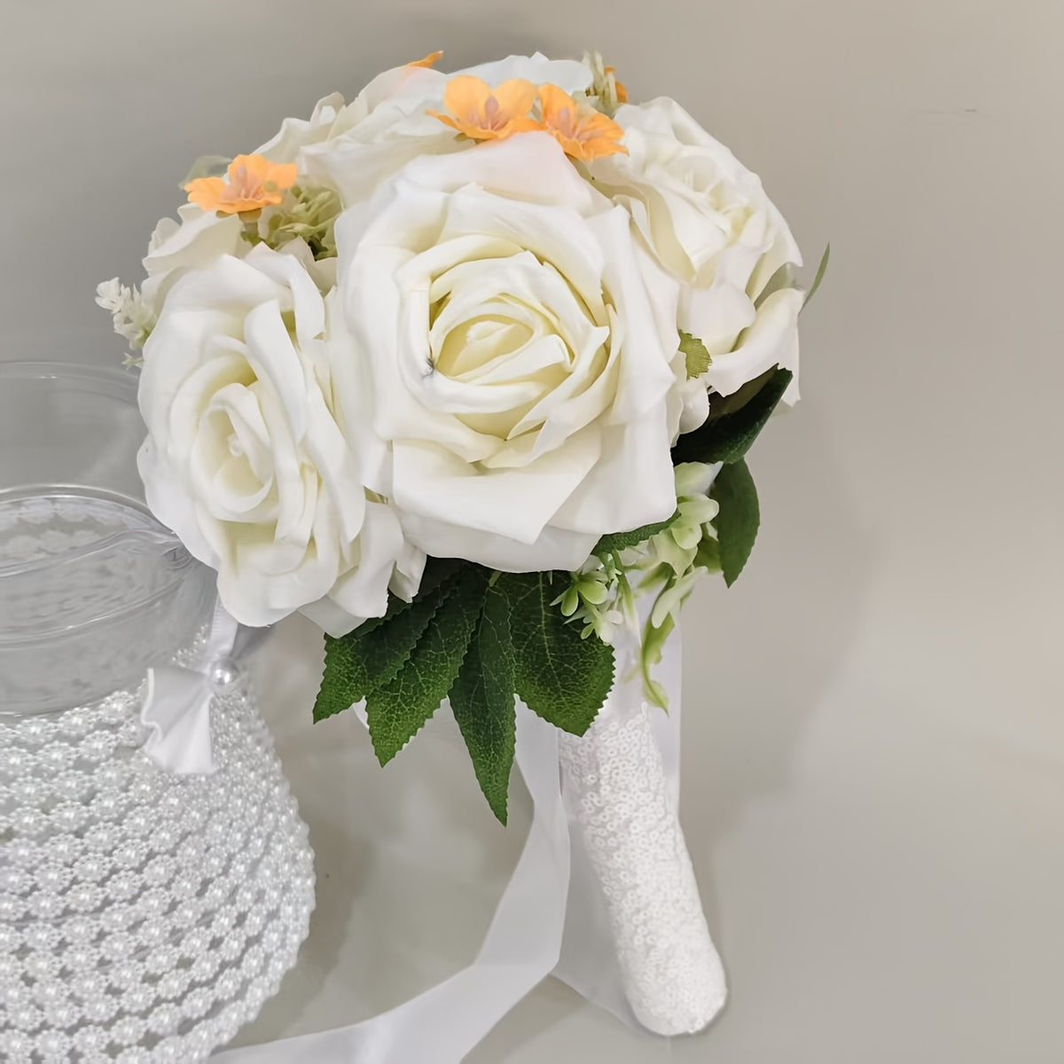 A Faux Bridal Bouquet with Green Leaves for a Forest-Themed Wedding, Perfect for Home Decoration